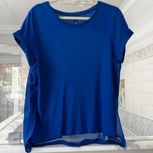 Royal blue Rayon front knit tee with sheer longer back. Very good condition